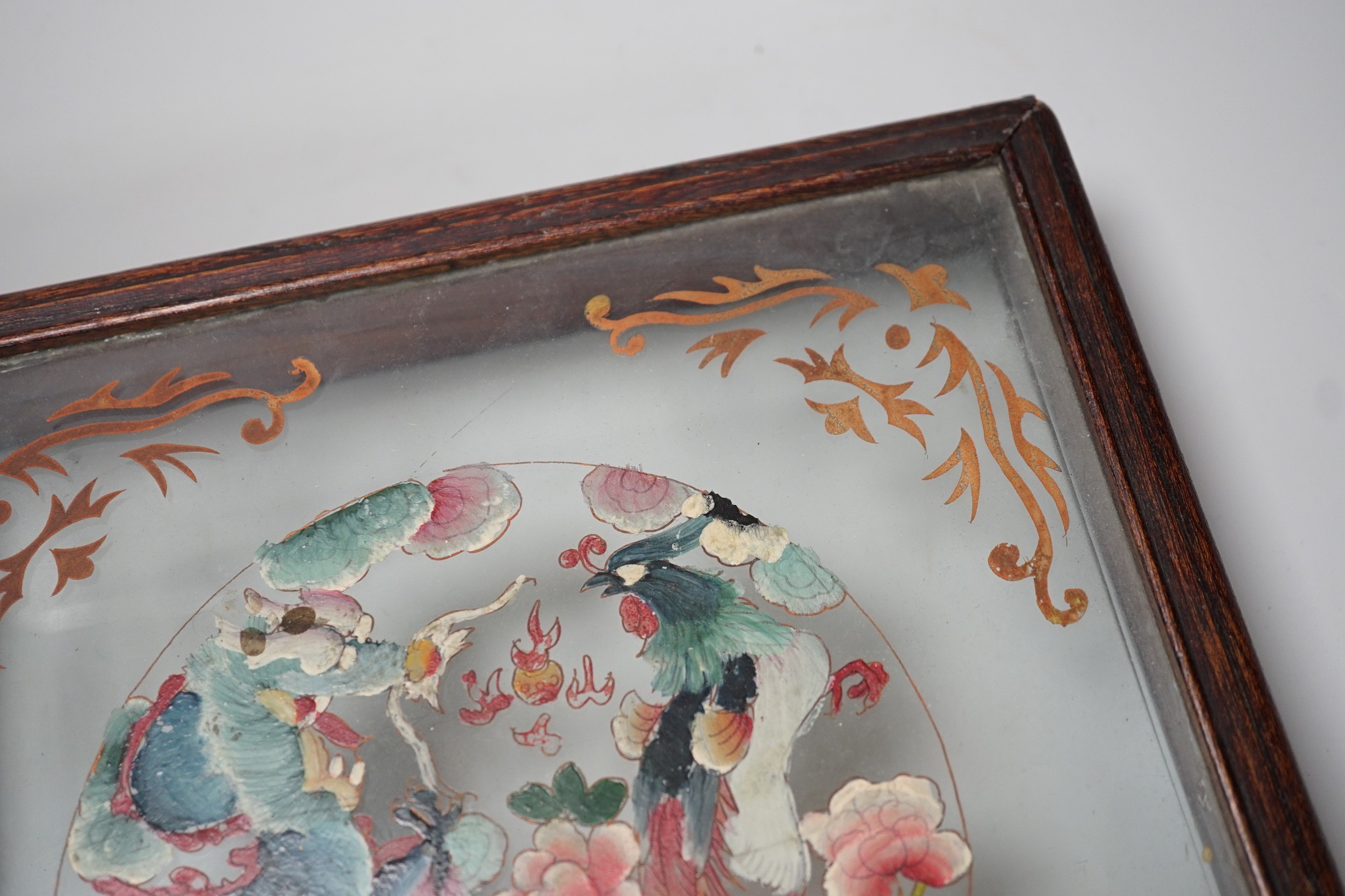 A Chinese reverse glass painting and a box cover with reverse painted glass panel